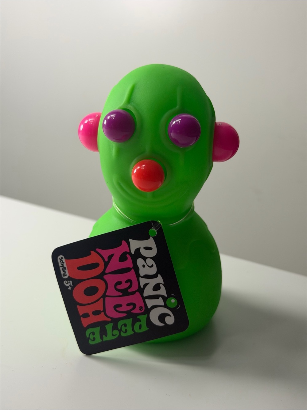 Needoh panic Pete plastic Figure Toy - Bright Green with Pink and Purple